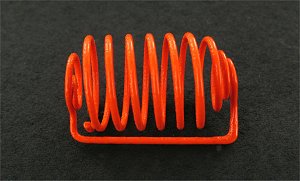 Spiral Capsule Sinker, Orange PTFE Coated Music Wire, 1.10″ (27.9mm) L x .41″ (10.4mm) W capacity, 6.5 coils